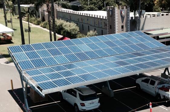 Energy-efficient solar car shade system at a well-lit parking lot